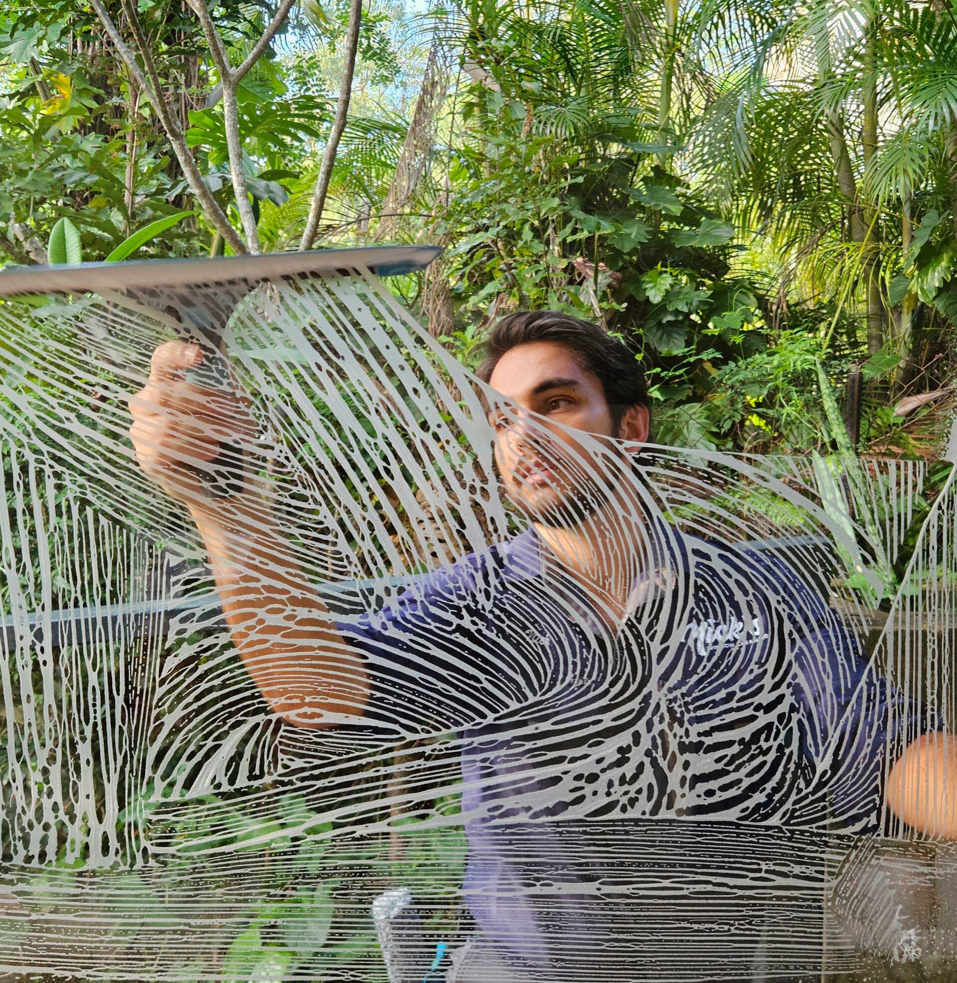 Nick cleaning windows in Brisbane